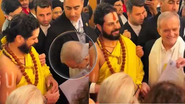 Iranian-President-touches-feet-of-Hindu-saint Iranian President touches feet of Hindu saint
